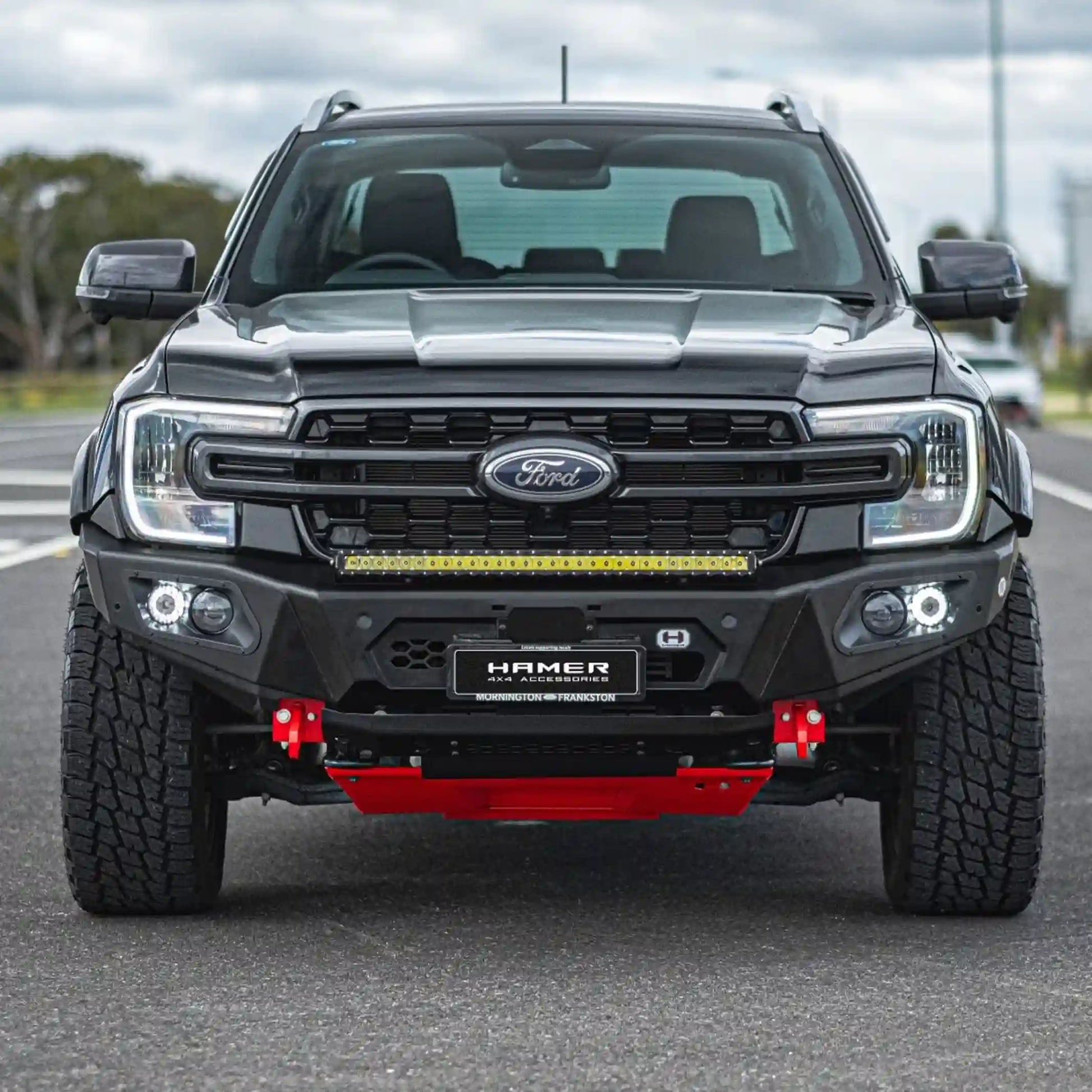 Front angle installed view of Hamer 4x4 King Series Bull Bar on Ford Ranger (2022–Present), highlighting winch-ready design, recovery points, and sleek fit.