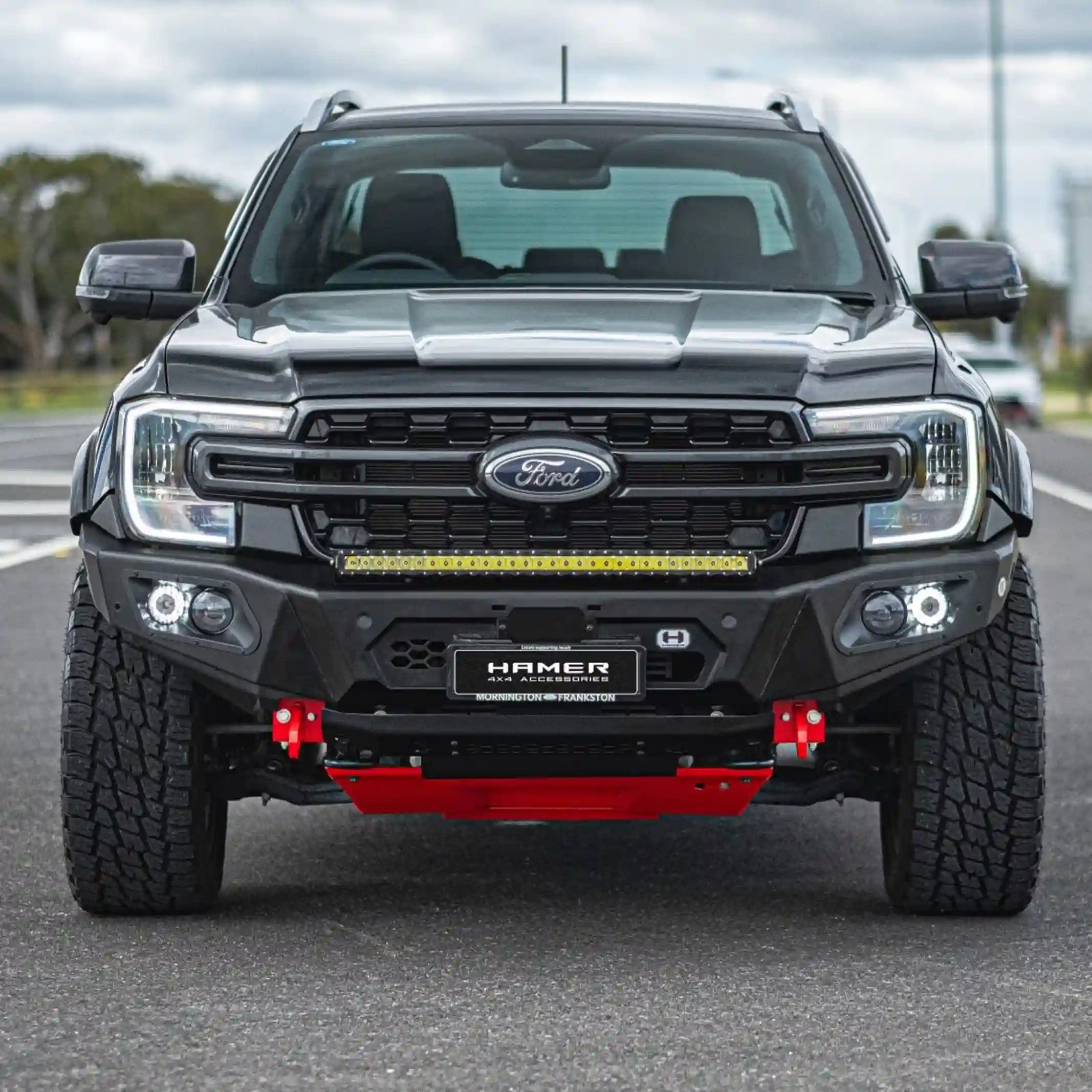Front angle installed view of Hamer 4x4 King Series Bull Bar on Ford Ranger (2022–Present), highlighting winch-ready design, recovery points, and sleek fit.
