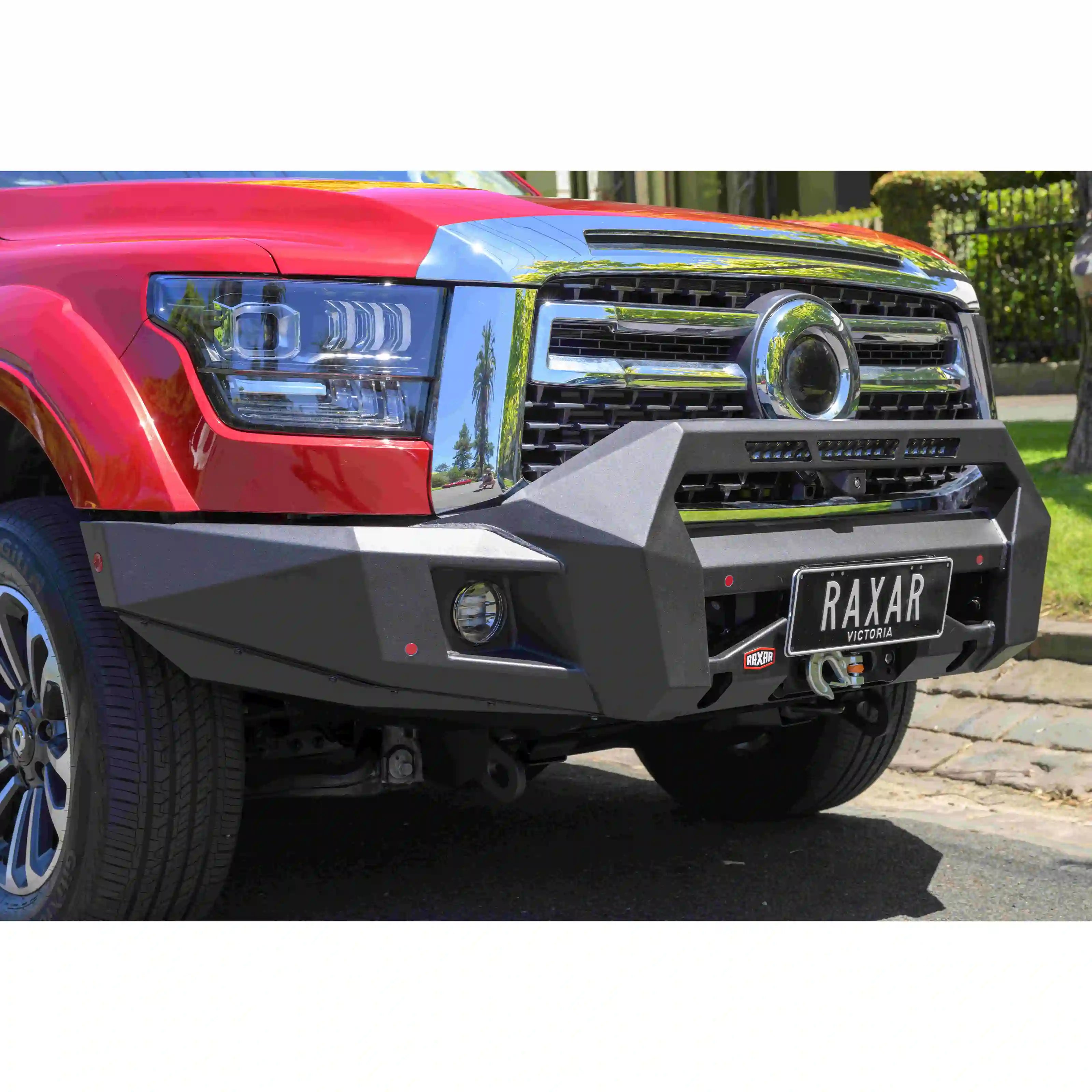 Left side of GWM Cannon Alpha showcasing RAXAR 4x4 Bull Bar, matte black finish with tech pack compatibility, fog lights, recovery points and durable steel design.