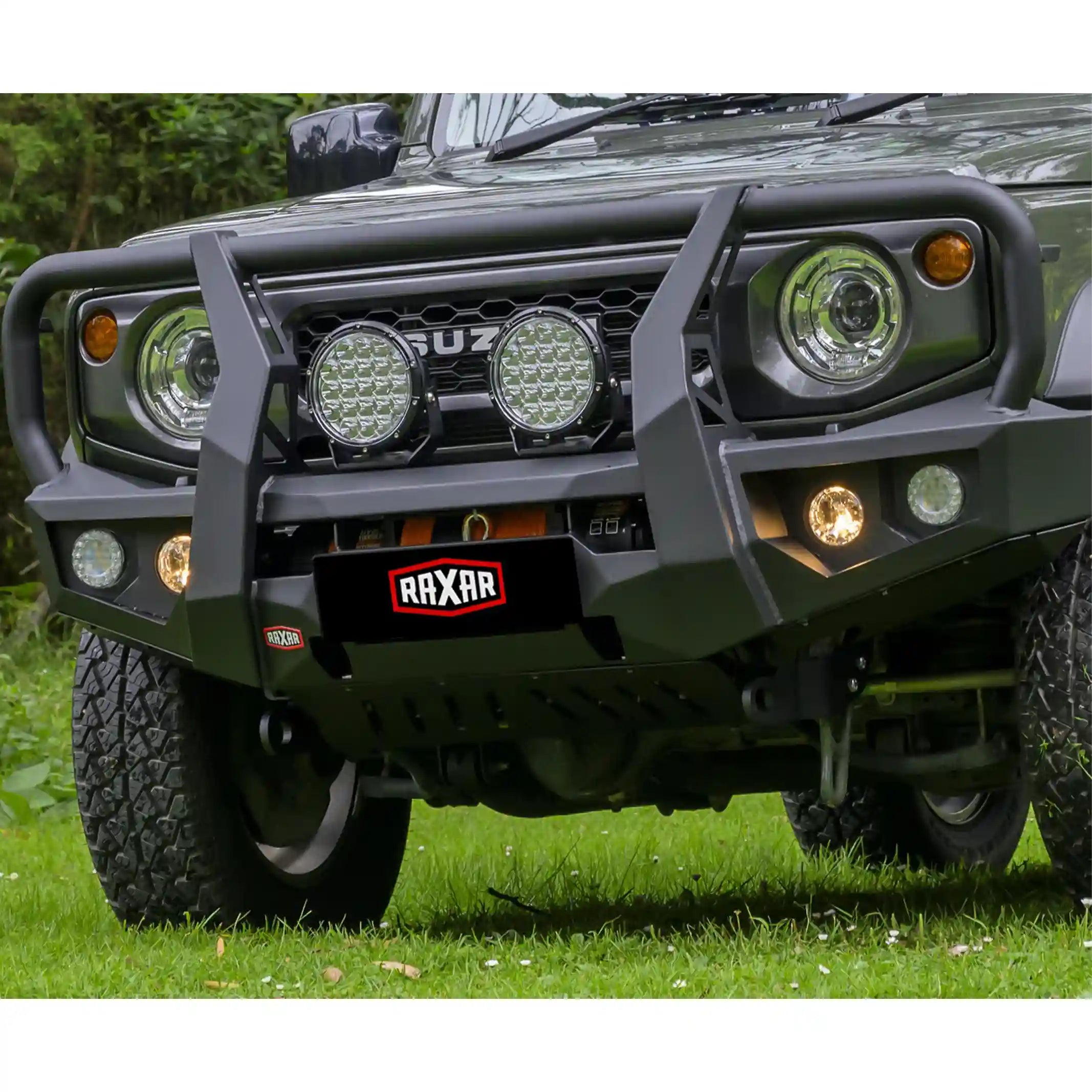 right installed view of suzuki jimny with raxar looped bull bar highlighting underbody bash plates high lift jacking points 4 tonne rated recovery points and split pan airflow design engineered for strength and style available nationwide at elevated 4x4