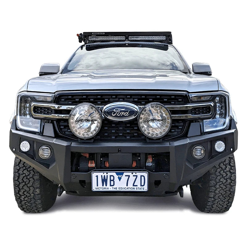 Angled installation view of the RAXAR no loop bull bar fitted to a Ford Next-Gen Ranger, showing clean lines, strong recovery points, and full winch compatibility. Perfect for worksites, touring, or off-road challenges, this RAXAR bull bar is available at Opposite Lock Cardiff, serving Newcastle, Central Coast, and Port Stephens regions.