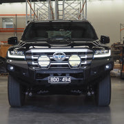 The Toyota LandCruiser 300 front-installed no loop bull bar from Elevated 4x4 showcases RAXAR’s tough bumper replacement design, matte black powder-coated finish, and ADR compliance. Built for Australian 4WD drivers, it delivers reliable protection, winch compatibility, and a bold front-end style for both touring and off-road conditions.