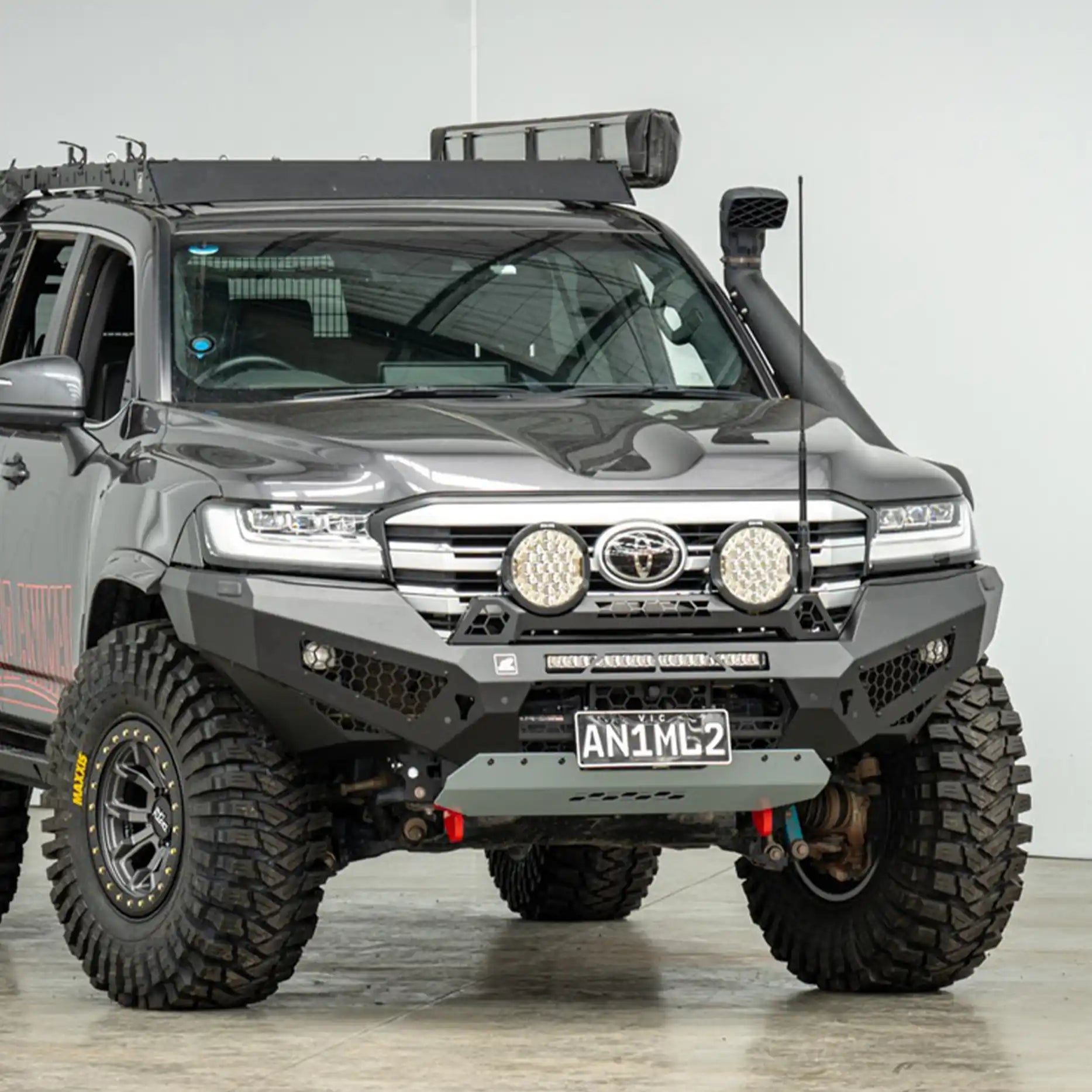 Right angle shot of the Offroad Animal Predator Bull Bar on a Toyota Land Cruiser 300 Series, highlighting its compact profile, rally hoop compatibility, and powder-coated steel finish. Installed by Elevated 4x4, it’s a perfect choice for drivers demanding power, protection, and standout styling around Port Stephens and the Central Coast.