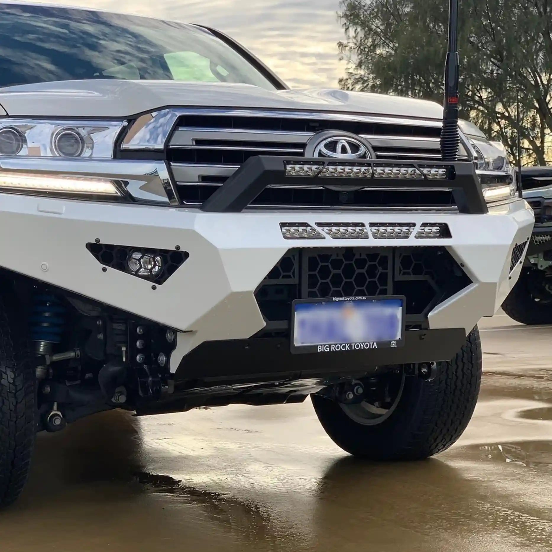 Close-up right view of the Offroad Animal Predator Bull Bar fitted to a Toyota Land Cruiser 200 Series, highlighting the robust steel mounts and matte black coating. Engineered and installed by Elevated 4x4, it delivers next-level durability and visual appeal for off-roaders across the Hunter Valley and beyond.