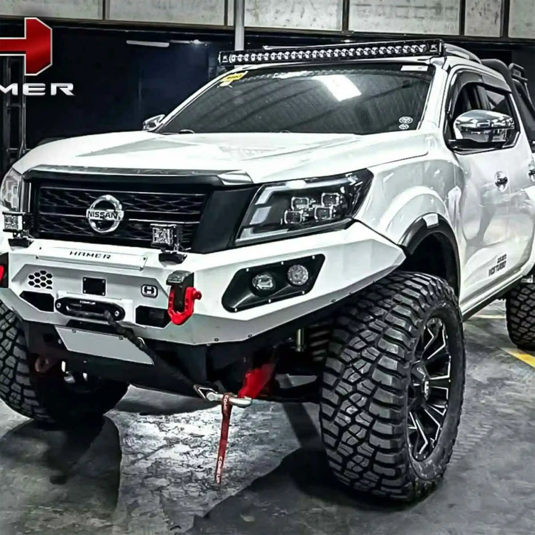 Right profile of Nissan Navara (2021–Present) showcasing Hamer King Bull Bar, a robust bumper replacement with mounting points for lights and aerial.