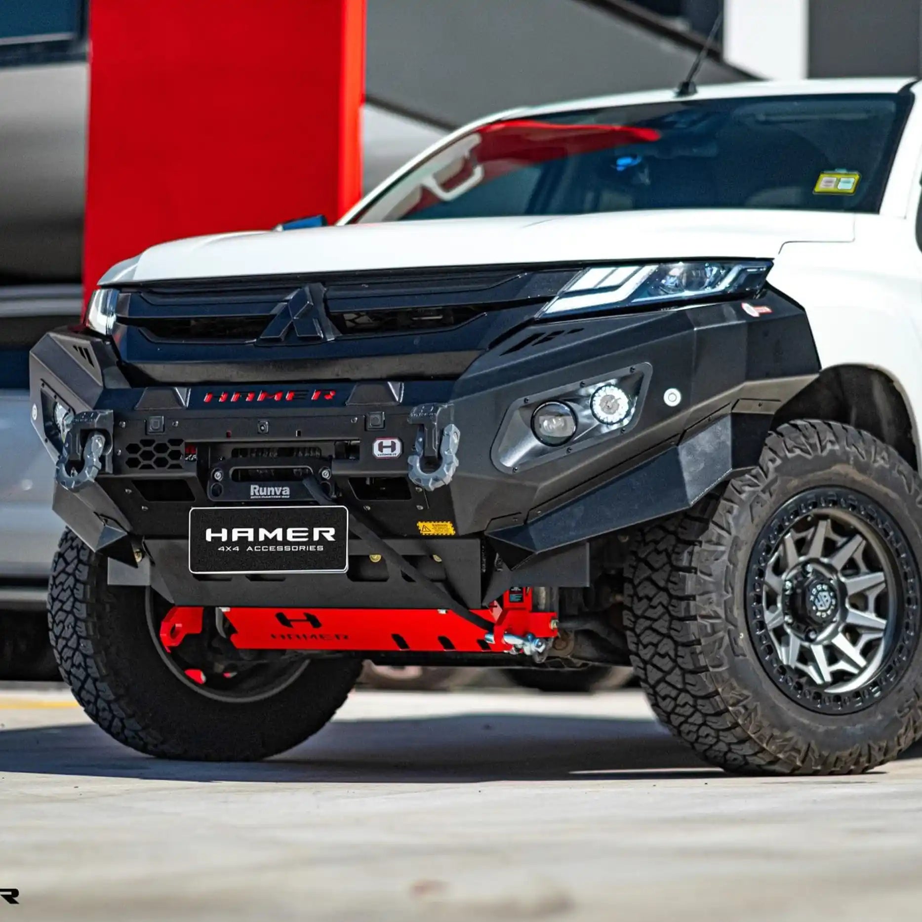 Left side view of Mitsubishi Triton MR (2018–Present) with Hamer King Series Bull Bar, offering sleek design, durability, and off-road readiness.