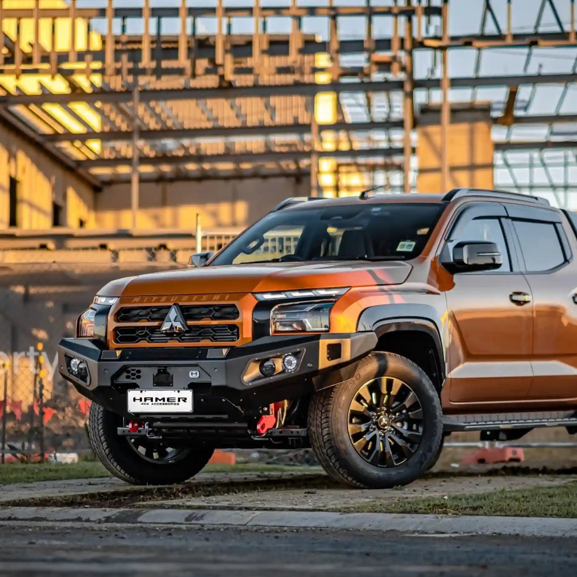 Right side profile of Mitsubishi Triton MV (2024–Present) equipped with Hamer King Bull Bar, winch ready with parking sensor and sonar compatibility.