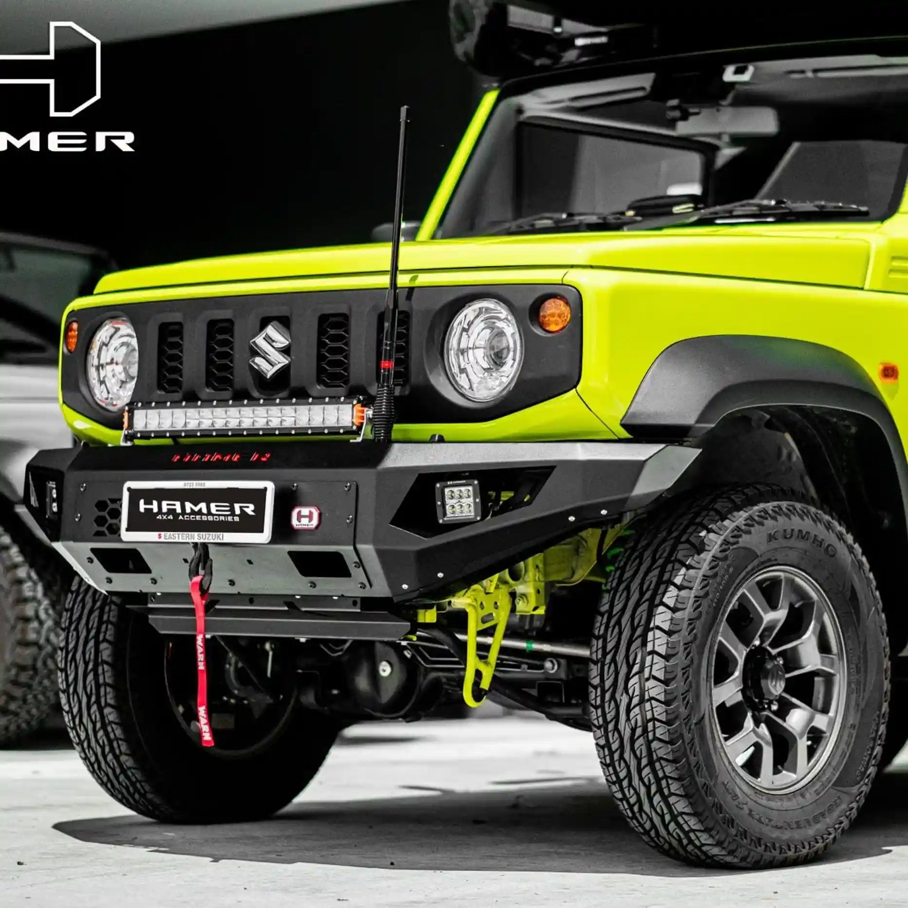 Right profile of Suzuki Jimny JB74W (2018–Present) highlighting Hamer King Bull Bar, integrated LED indicators and strong build.