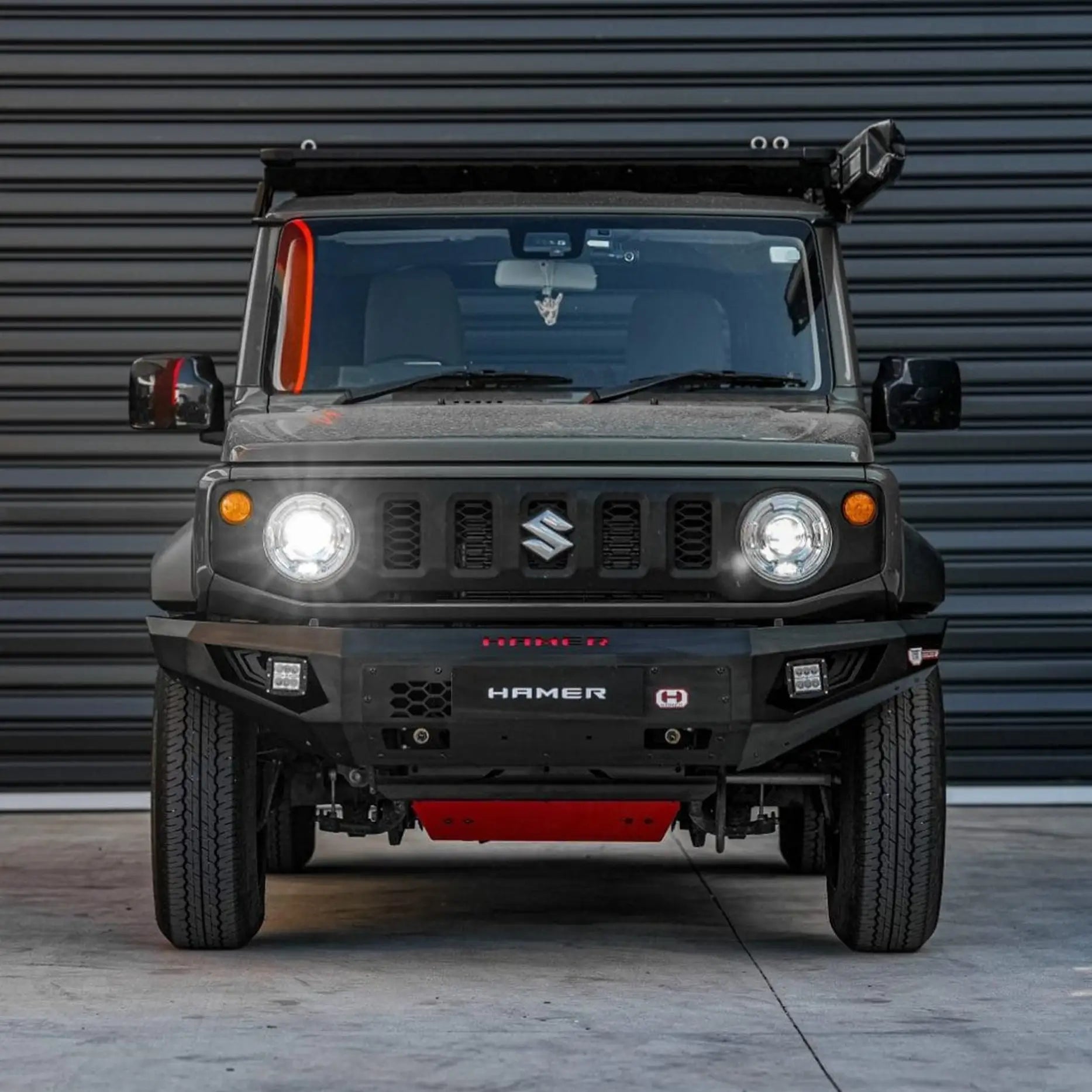 Front view of Suzuki Jimny JB74W (2018–Present) with Hamer King Bull Bar, 3mm steel, ADR compliant, sleek and rugged design.