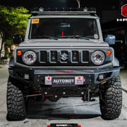 Front view of Suzuki Jimny XL 2023 with Hamer King Series Bull Bar, matte black steel build with ADR compliance and LED lighting.