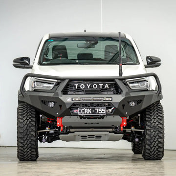 Front view of the Offroad Animal Toro Bull Bar installed on a Toyota Hilux GR Sport N80, showcasing its wide-body fitment and aggressive styling. Designed by Elevated 4x4, this ADR-compliant steel bar enhances protection, airflow, and winch capability, delivering unbeatable strength and style for Australian off-road conditions.
