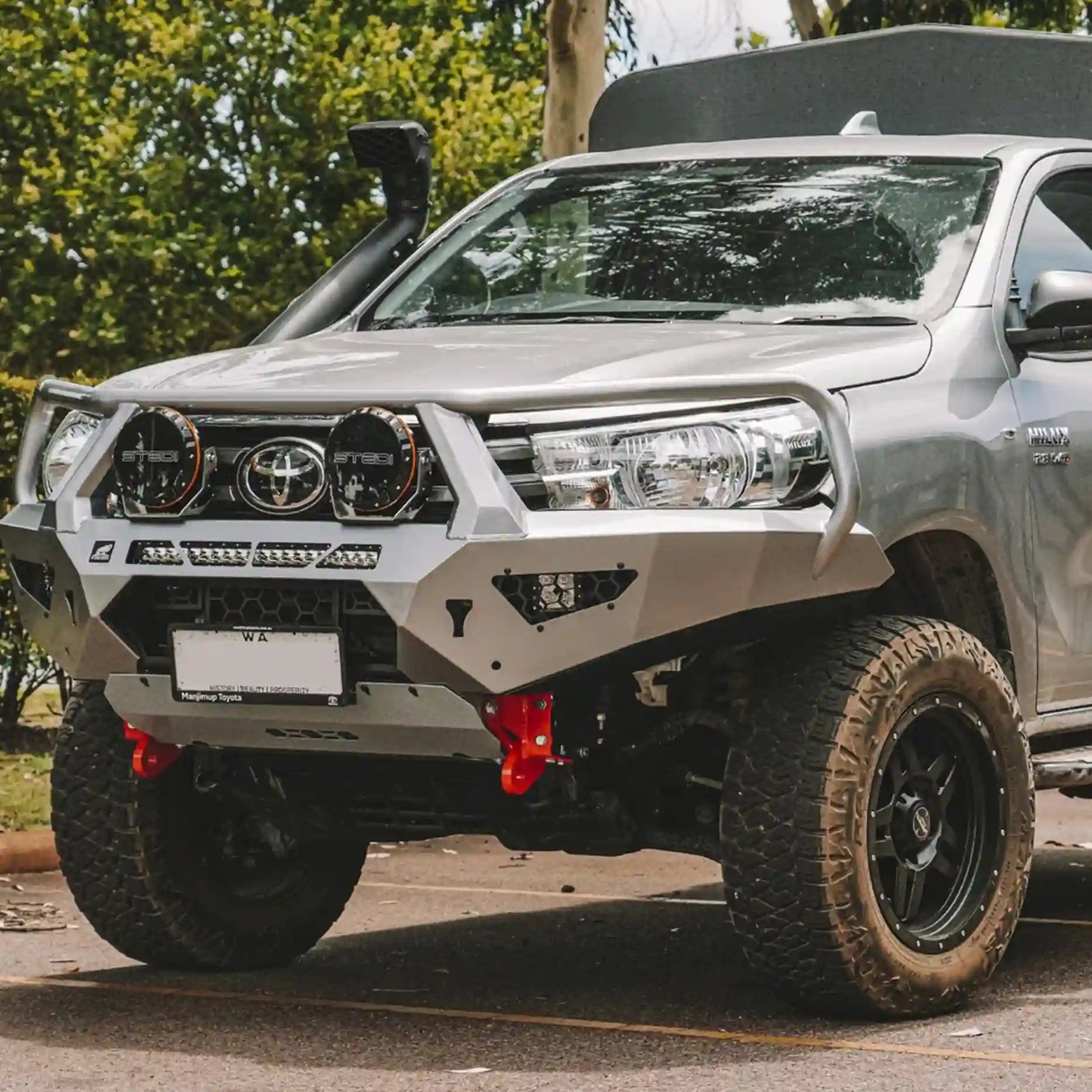 Front view of the Offroad Animal Toro Bull Bar fitted to a Toyota Hilux N80 (2015–2020), displaying its aggressive design, full-steel construction, and integrated recovery points. This premium bull bar by Elevated 4x4 provides superior protection, winch compatibility, and enhanced airflow — perfect for off-road adventures across Newcastle, Maitland, and the Hunter Valley.