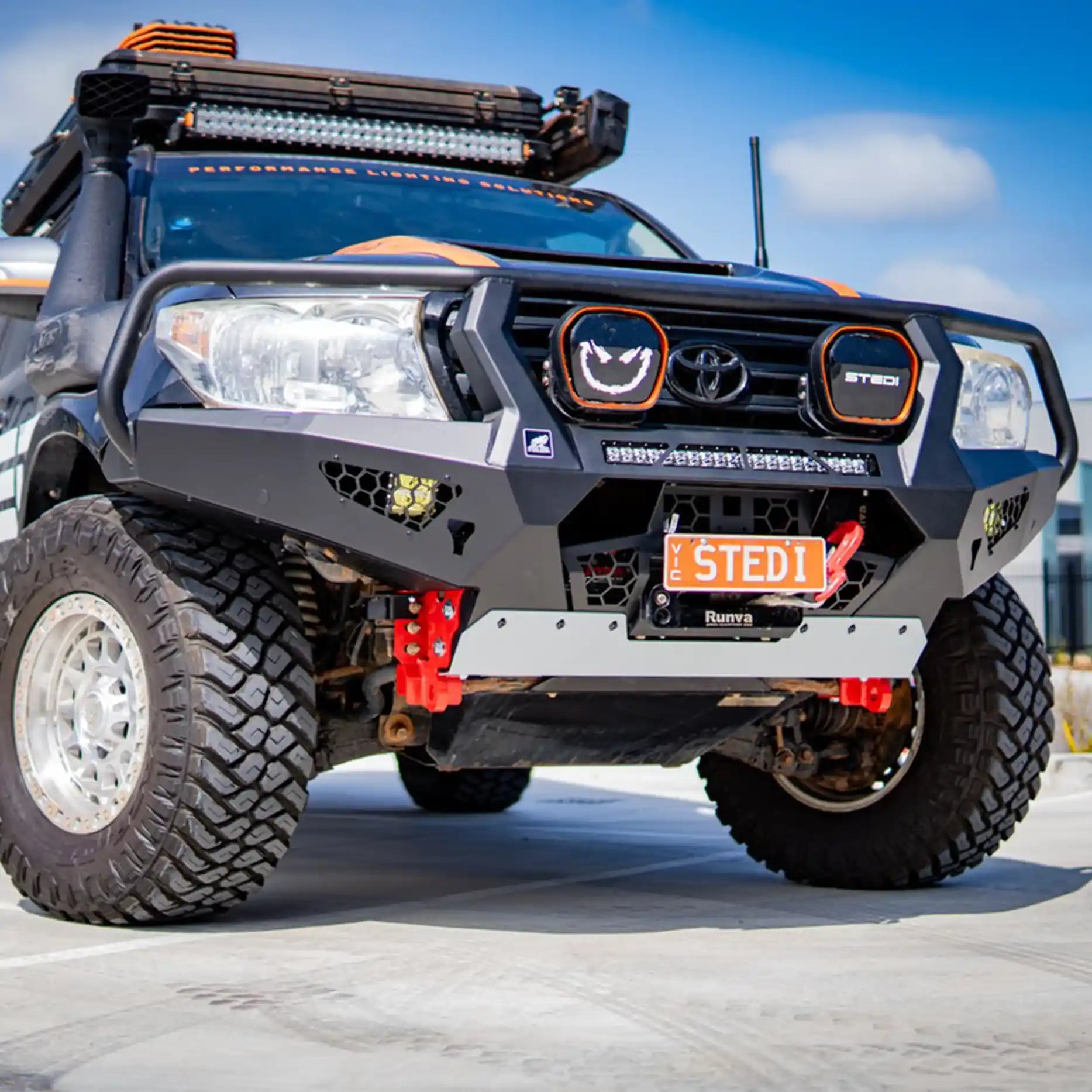 Front view of the Offroad Animal Toro Bull Bar fitted to a Toyota Land Cruiser 200 Series (2008–2014), showcasing its bold, full-steel construction and aggressive styling. Engineered by Elevated 4x4, this ADR-compliant bar enhances front-end protection, airflow, and off-road functionality across Newcastle, Maitland, and the Hunter Valley regions.
