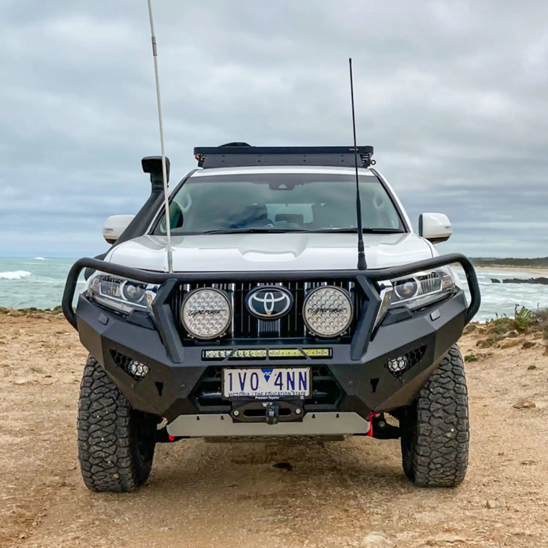 Front view of the Offroad Animal Toro Bull Bar fitted to a Toyota Prado 150 Series, featuring its aggressive styling, precision welds, and integrated LED light bar mount. Professionally installed by Elevated 4x4, this heavy-duty matte black bull bar enhances airflow, approach angle, and off-road confidence for Newcastle and Hunter Valley 4WD owners.