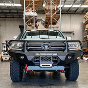 Front view of the Offroad Animal Toro Bull Bar on a Toyota Land Cruiser 200 Series, featuring its bold design, integrated LED light bar mount and matte black finish. Installed by Elevated 4x4, this heavy-duty bumper delivers unmatched protection and airflow for serious off-roaders in Newcastle and the Hunter Valley.