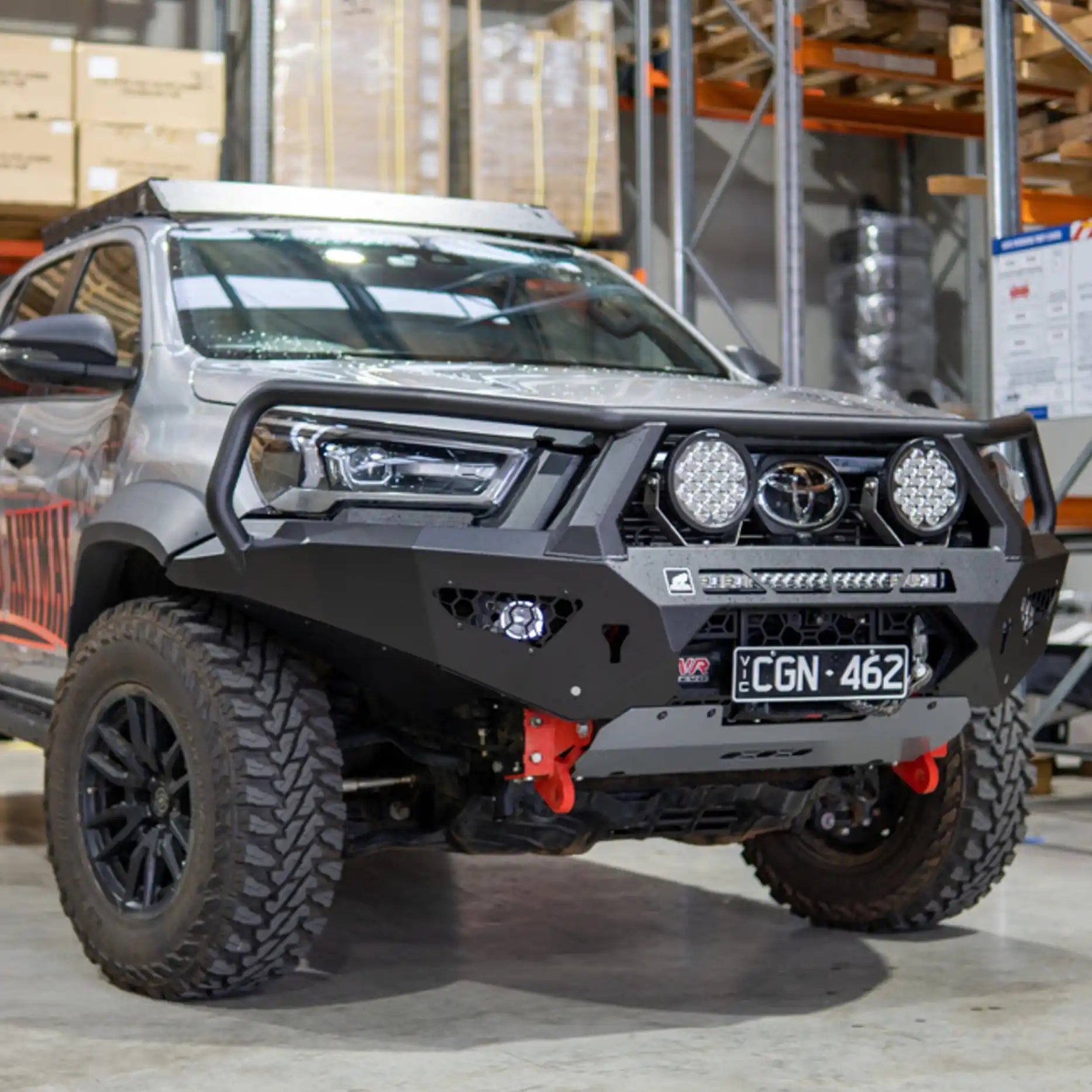 Right-angle view of the Offroad Animal Toro Bull Bar fitted to a Toyota Hilux Rogue Wide Body, highlighting its precise fitment, matte-black powder coat, and tough one-piece design. Elevated 4x4’s build ensures exceptional strength, style, and safety performance for Australian 4WD enthusiasts.