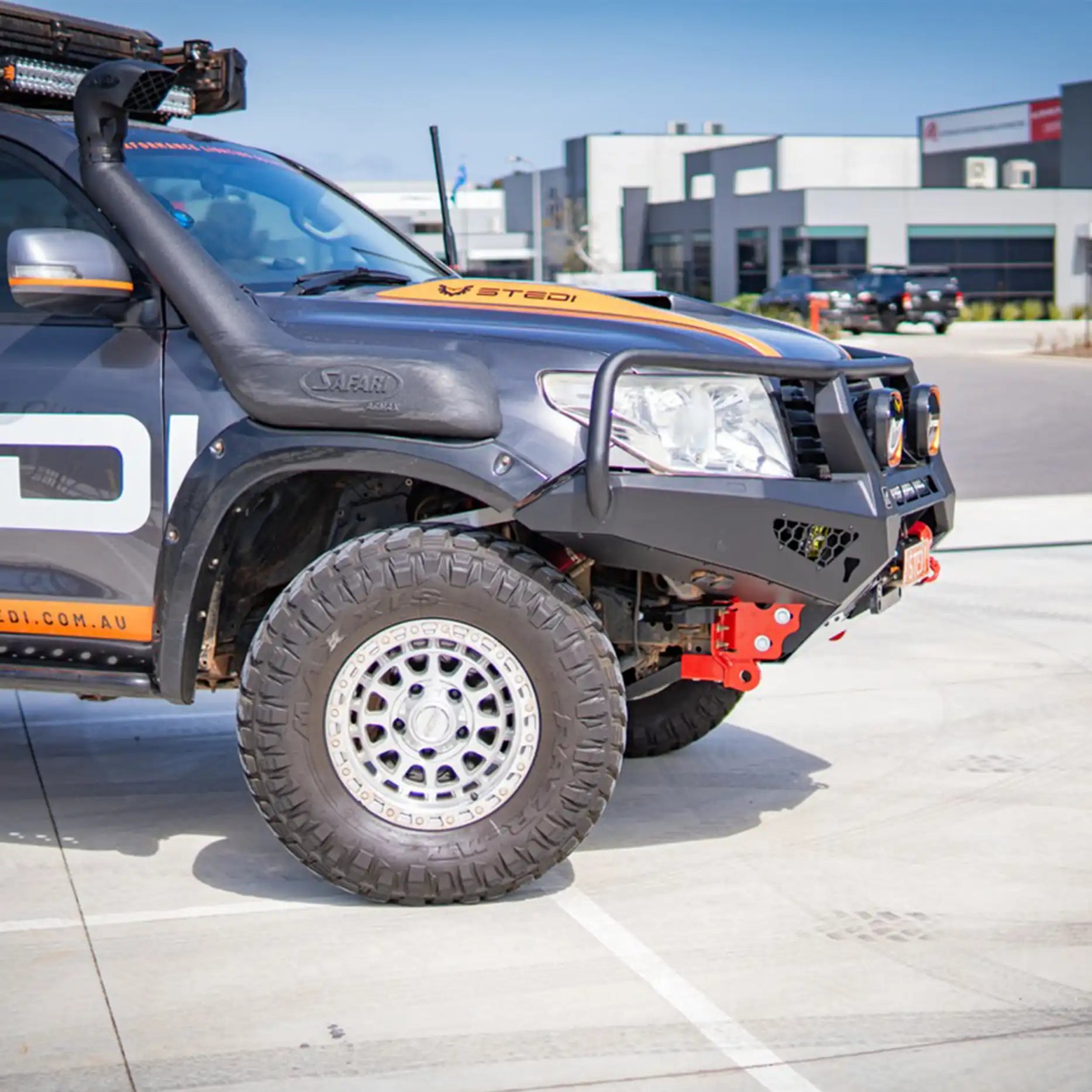 Right-side view of the Offroad Animal Toro Bull Bar installed on a Toyota Land Cruiser 200 Series, emphasizing its seamless fitment, aerodynamic profile, and compatibility with winches and LED light bars. Built by Elevated 4x4, this bar offers elite protection and rugged styling for all-terrain driving across the Central Coast and Port Stephens.