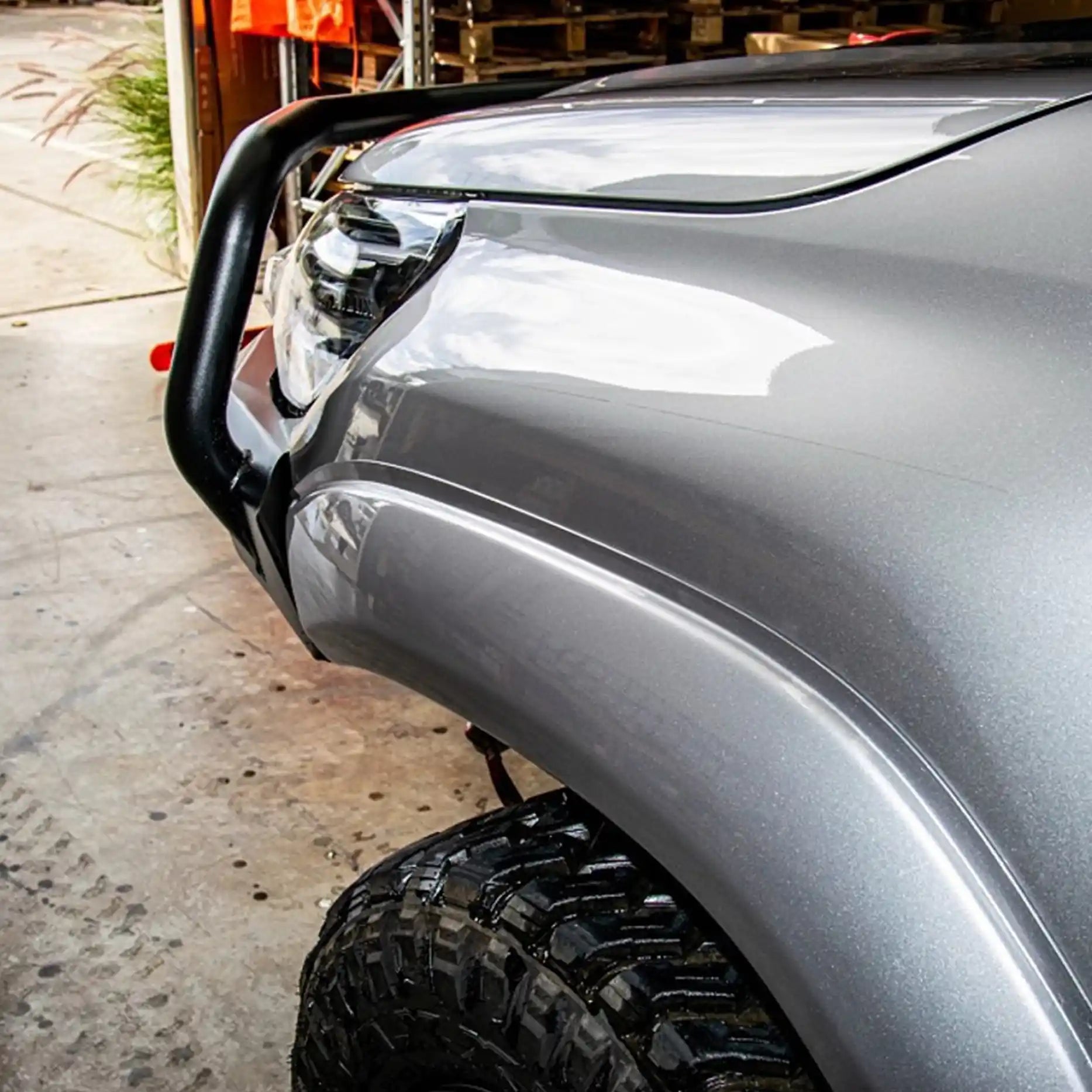 Side view of the Offroad Animal Toro Bull Bar on a Toyota Hilux N80 (2015–2020), highlighting its sleek fitment, matte-black powder coat finish, and compact profile. Engineered by Elevated 4x4 for strength and style, this bar combines functionality and toughness for demanding 4WD conditions throughout Cardiff, Central Coast, and Port Stephens.