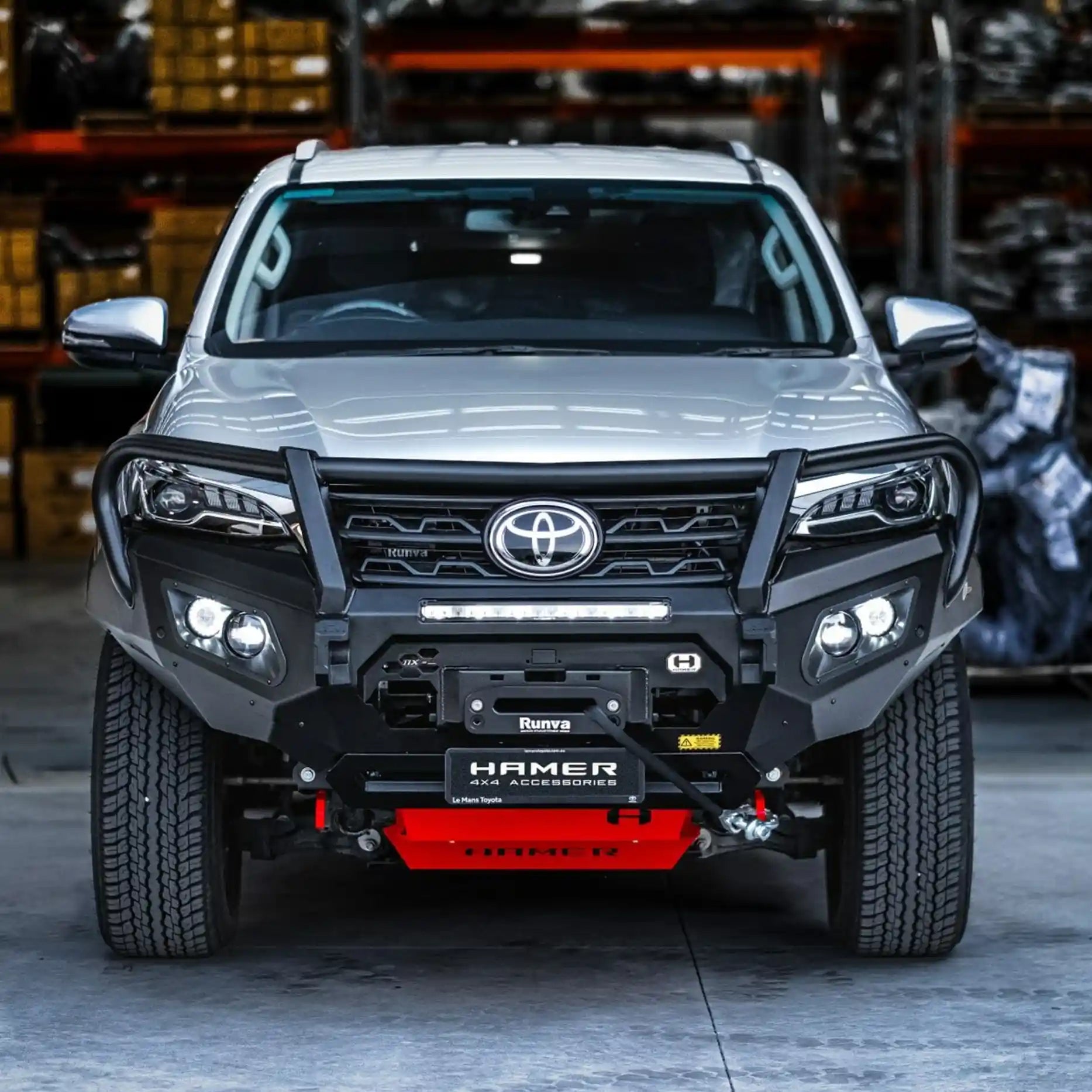 Front view of Toyota Fortuner with Hamer King Plus Bull Bar, 3mm steel ADR compliant, matte black finish, sleek rugged design.
