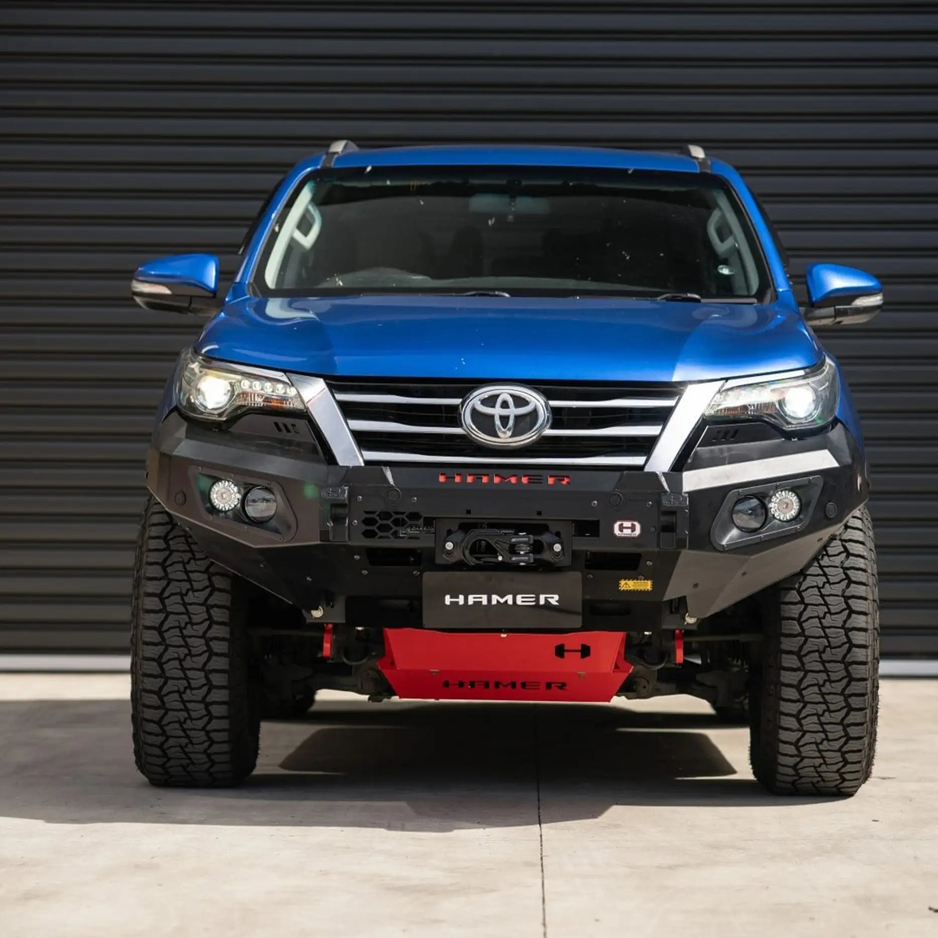 Front view of Toyota Fortuner 2020 with Hamer King Series Bull Bar, matte black steel build, ADR compliant with LED lights.