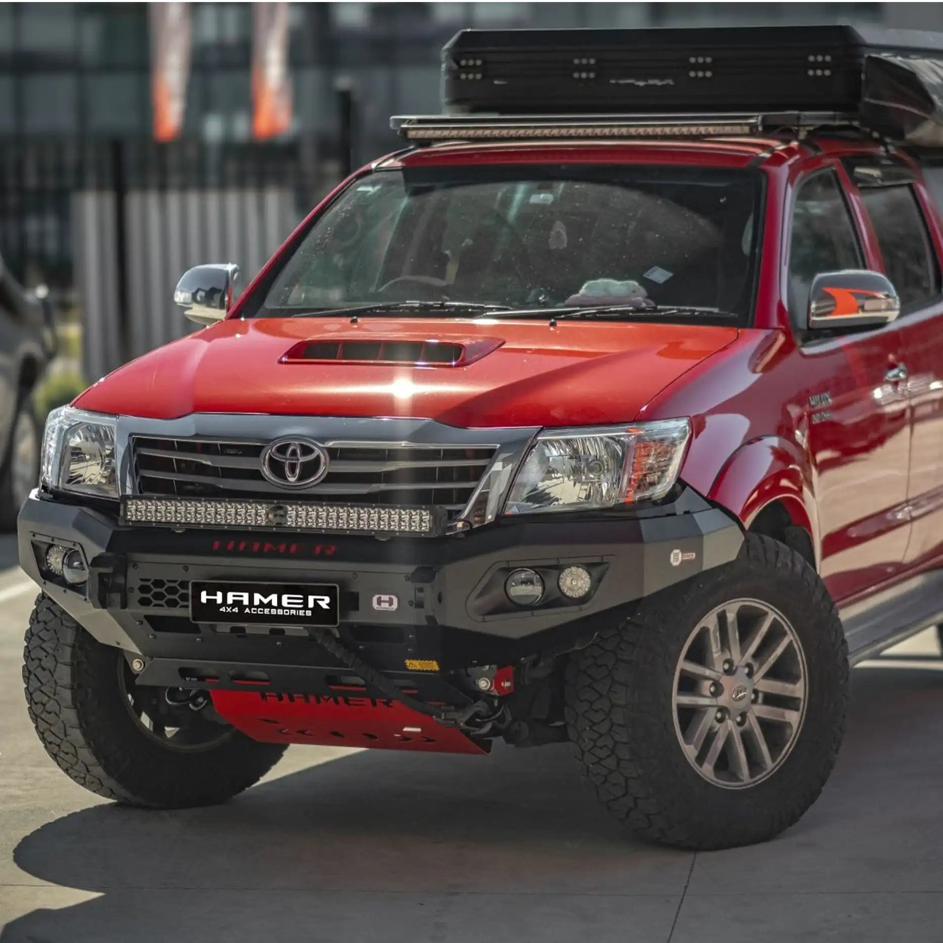 Right side view of Hilux 2011–2015 fitted with Hamer King Bull Bar, ADR compliant, winch compatible, integrated fog lights.