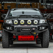 Front view of Toyota Hilux 2011–2015 with Hamer King Bull Bar, ADR compliant, matte black steel with LED fog and DRL lights.
