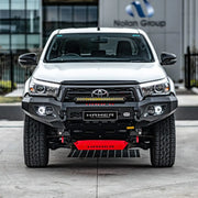 Front view of Toyota Hilux (2018–2020) with Hamer King Bull Bar, matte black steel, ADR compliant with winch compatibility.