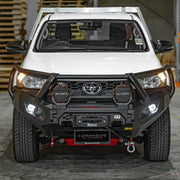 Front view of Toyota Hilux 2024 with Hamer King Series Plus Bull Bar, triple loop matte black steel, ADR compliant and winch compatible.