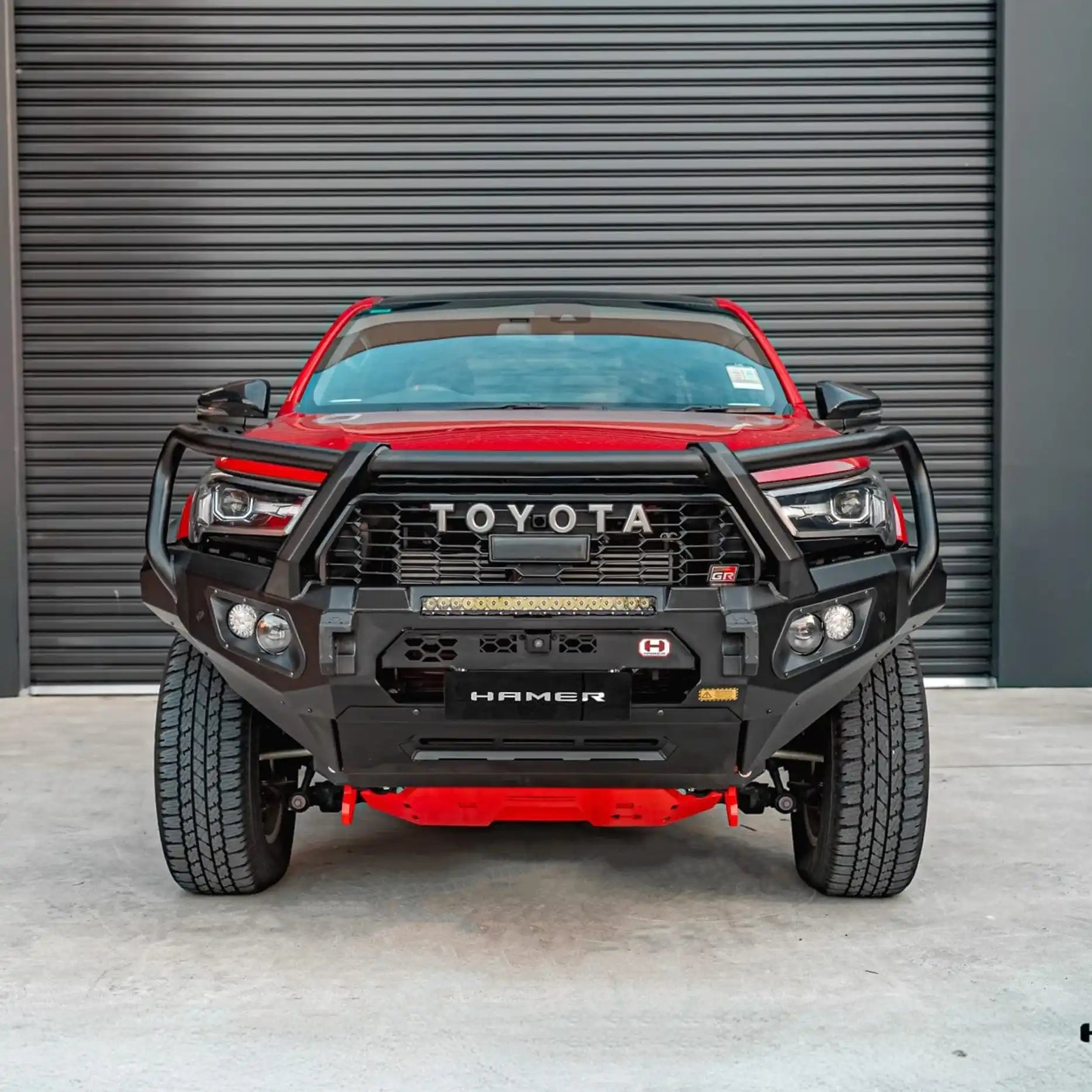 Front view of Toyota Hilux GR (2023–Present) with Hamer King Plus Bull Bar, ADR compliant, winch ready and integrated LED lighting.