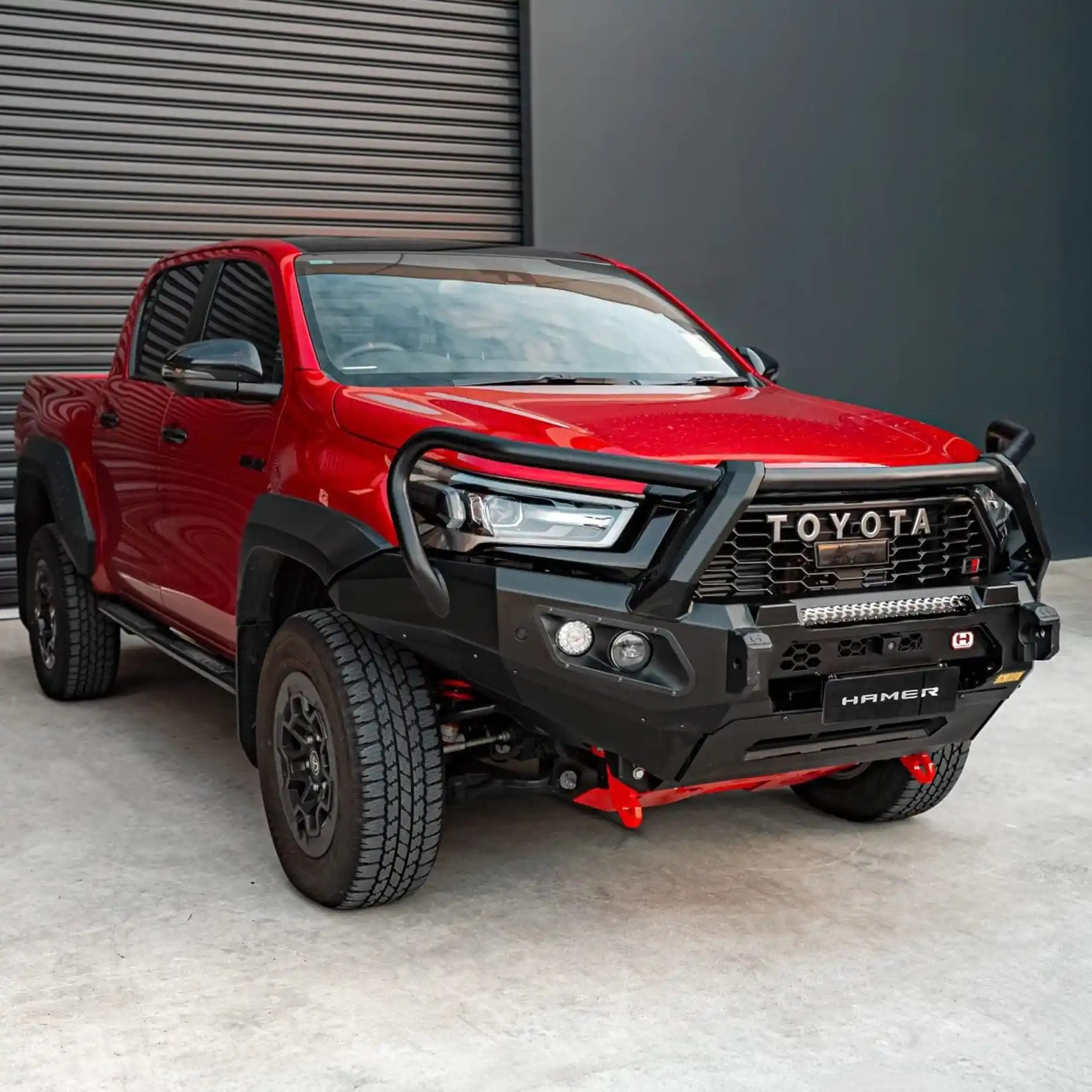 Left profile of Hilux GR (2023–Present) fitted with Hamer King Plus Bull Bar, 3mm steel build, E-Mark LED lights and sleek OEM integration.