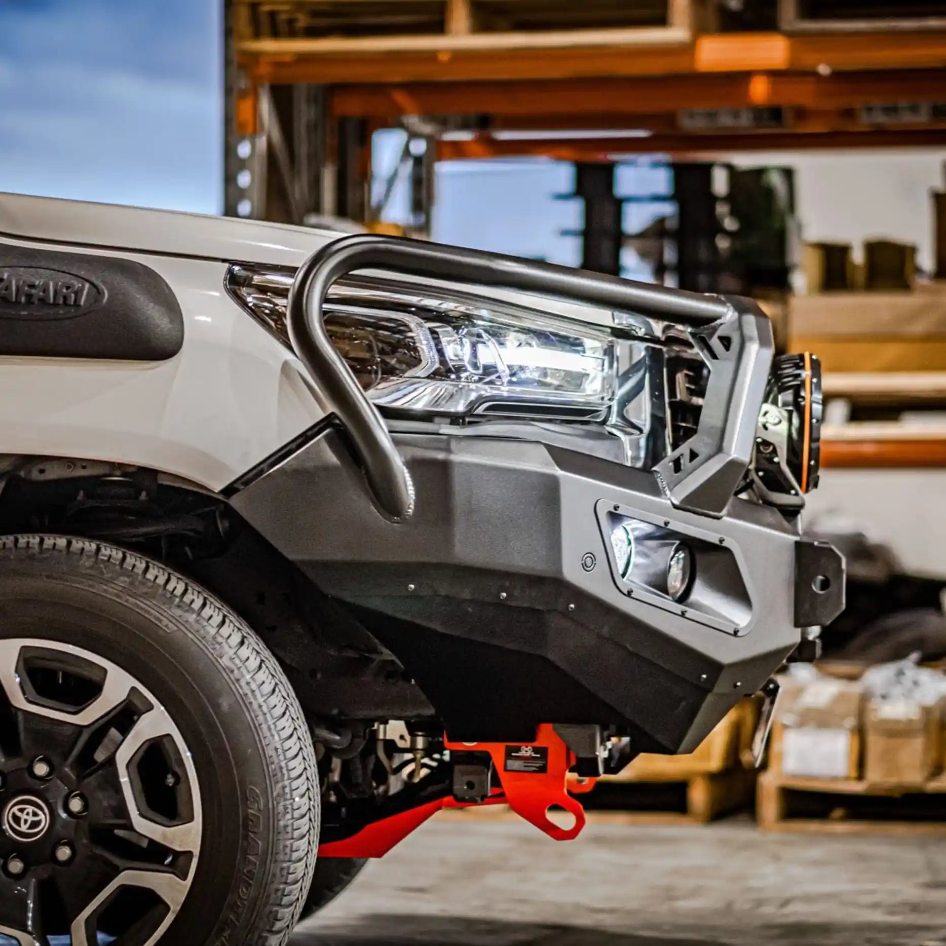 Left-side view of Toyota Hilux (2020 – 2023) with Hamer King Series Plus Bull Bar, highlighting sleek integration, matte black powder coat finish, and accessory mounting points.