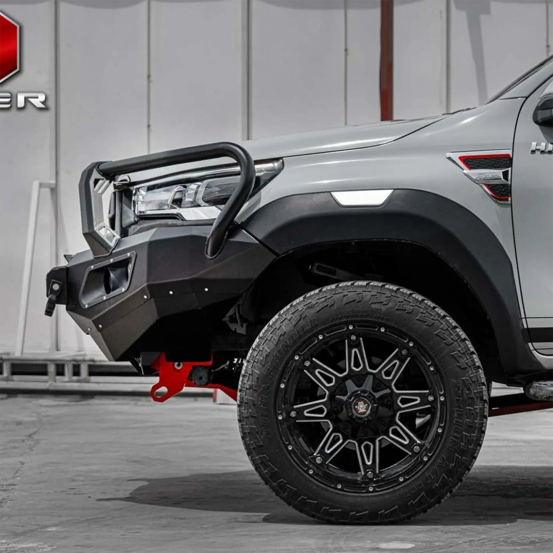Right-side view of Toyota Hilux (2020 – 2023) equipped with Hamer King Series Plus Bull Bar, showing strong steel construction, LED lights, and off-road ready design.