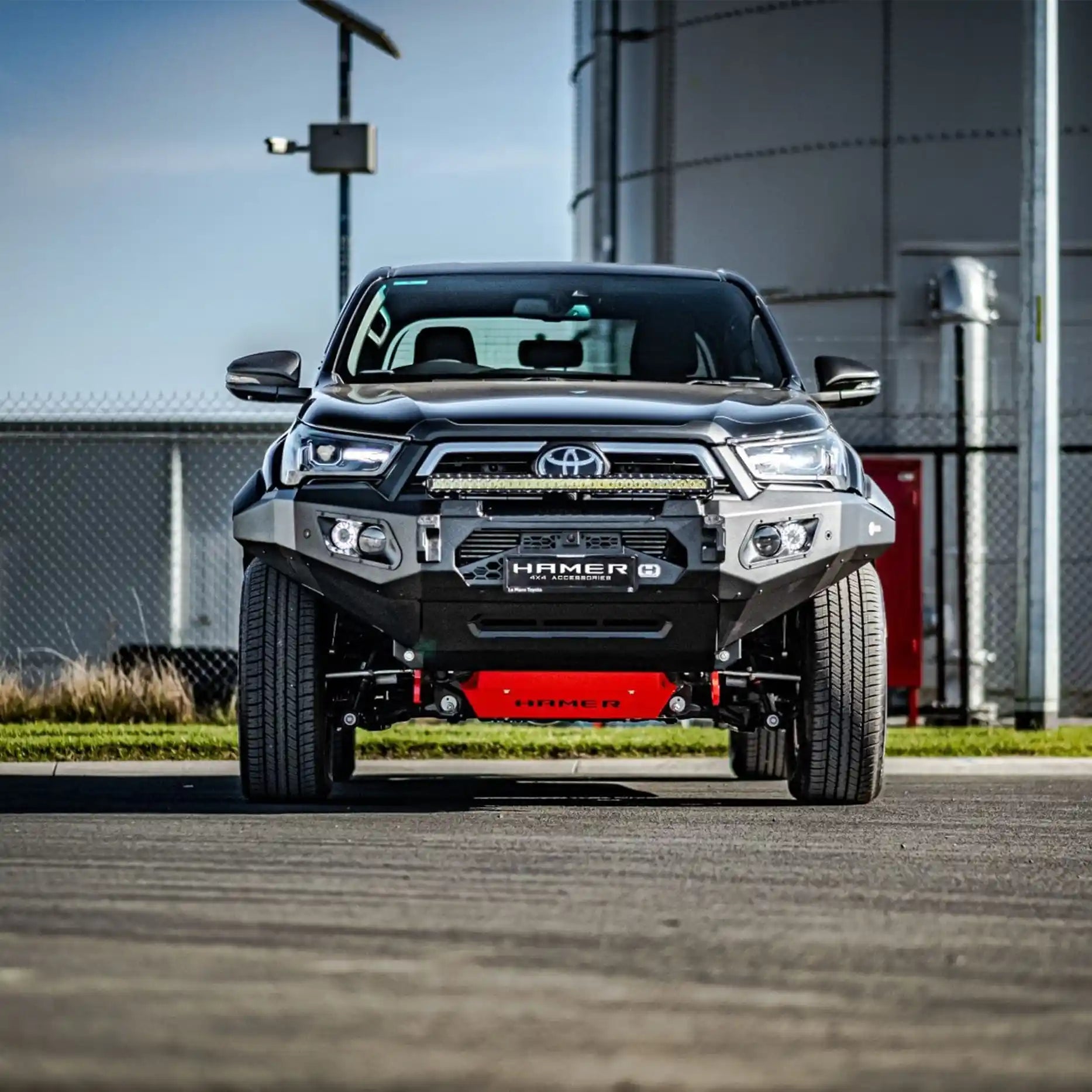 Front view of Toyota Hilux Rogue (2022–Present) with Hamer King Bull Bar, sleek matte black steel design, ADR compliant strength.