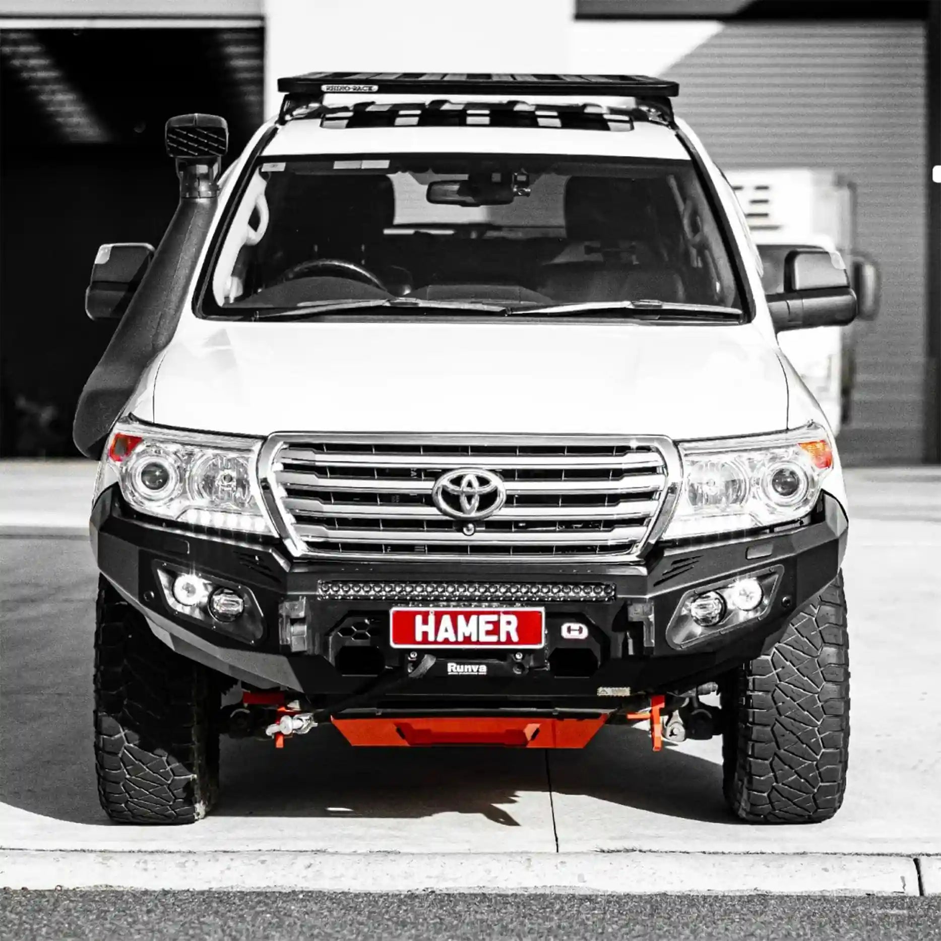 Angled front of Landcruiser 200 Series (2008–2015) featuring Hamer King Bull Bar, 3mm steel, winch ready with recovery points.