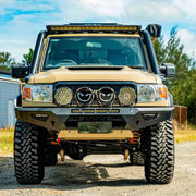 Front-on view of the Offroad Animal Predator Bull Bar fitted to a Toyota Land Cruiser 79 Series, showcasing aggressive design, perfect fitment, and superior protection. Designed and installed by Elevated 4x4, this bar combines style and strength for serious off-road driving across Newcastle and the Hunter Valley.