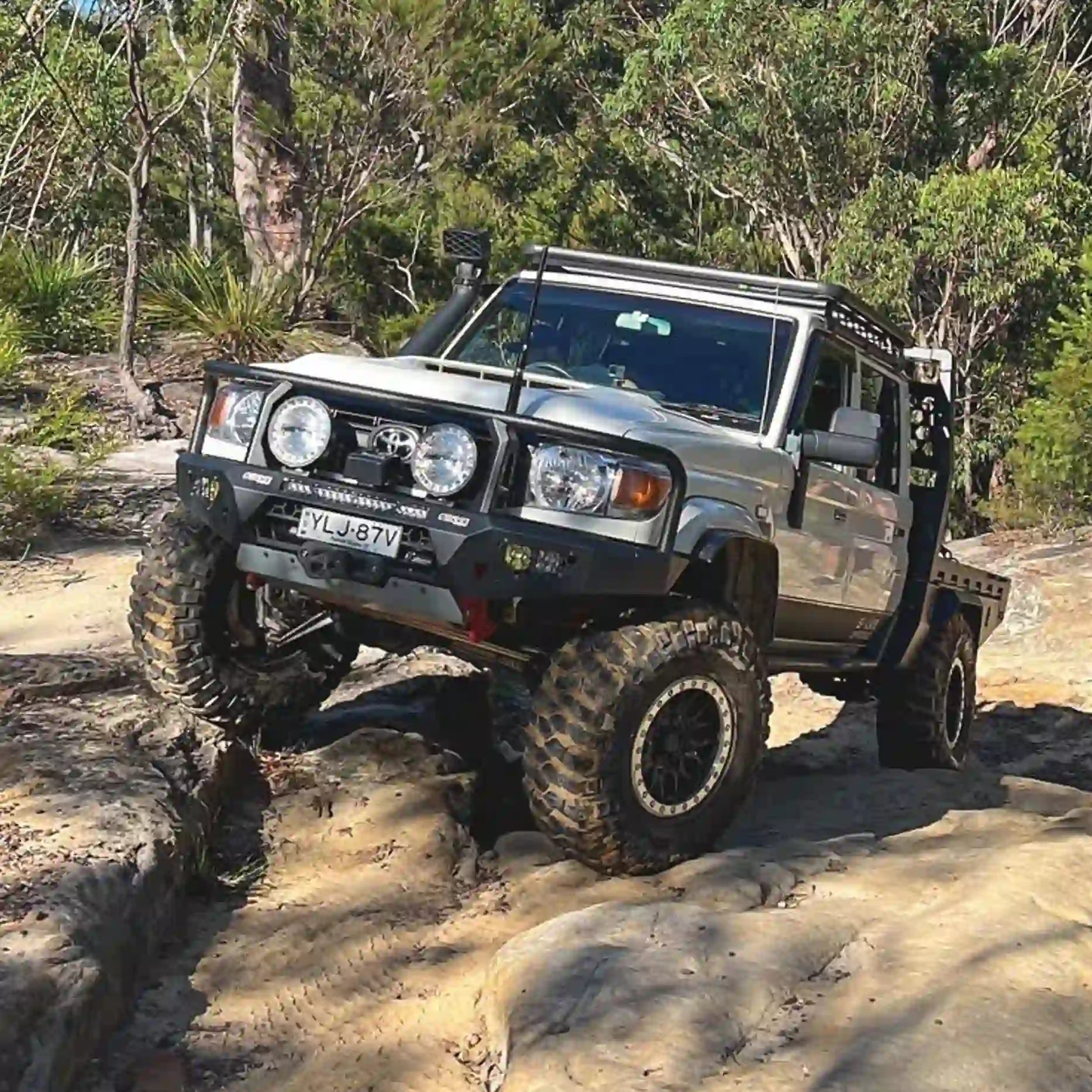 Front view of the Offroad Animal Toro Bull Bar on a Toyota Land Cruiser 79 Series, featuring a bold top hoop design and durable matte black powder coating. Installed by Elevated 4x4, this premium bar enhances airflow, strength, and off-road appeal across Newcastle and the Hunter region.