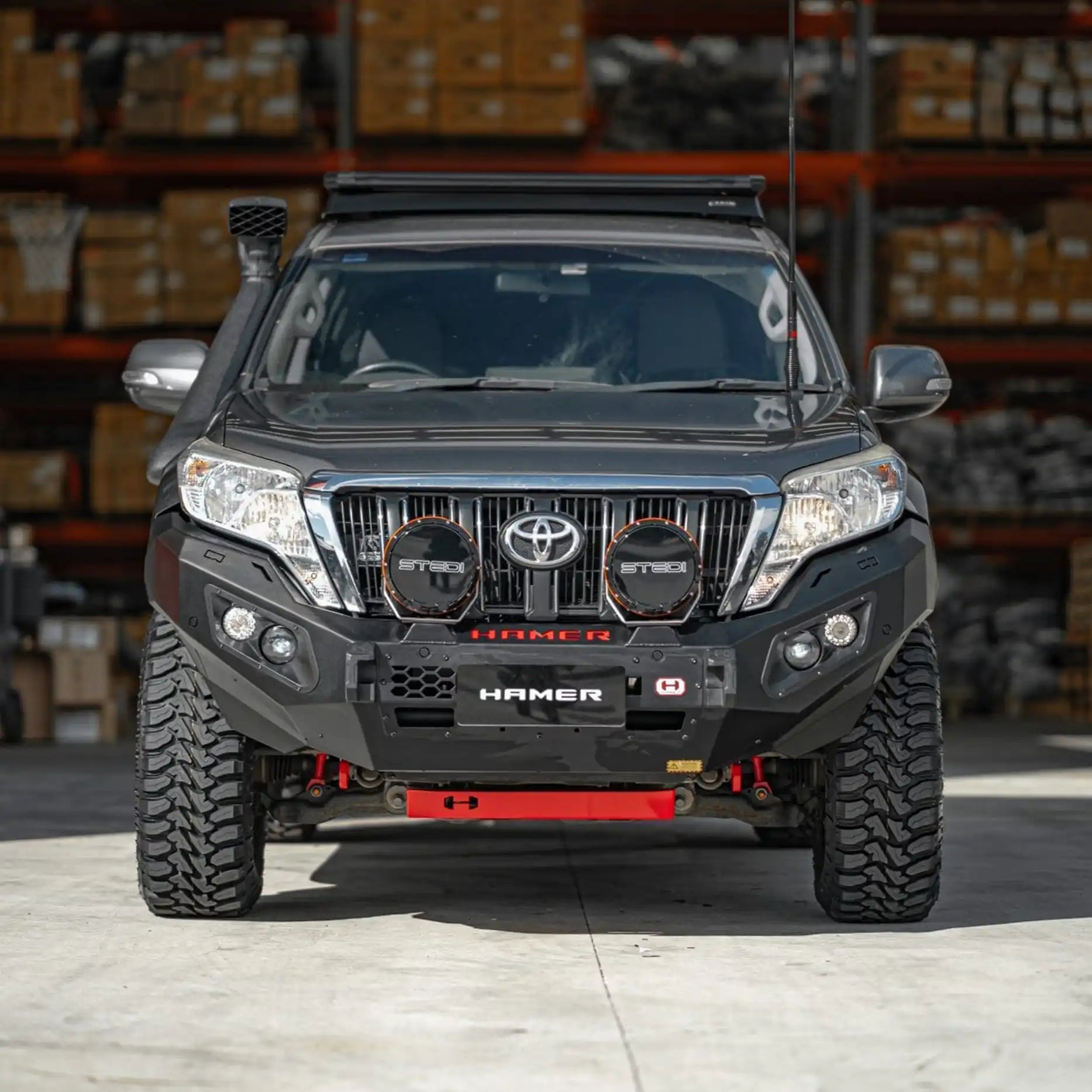 Front view of Toyota Prado 150 (2013–2017) with Hamer King Bull Bar, 3mm steel, ADR compliant, matte black rugged design.