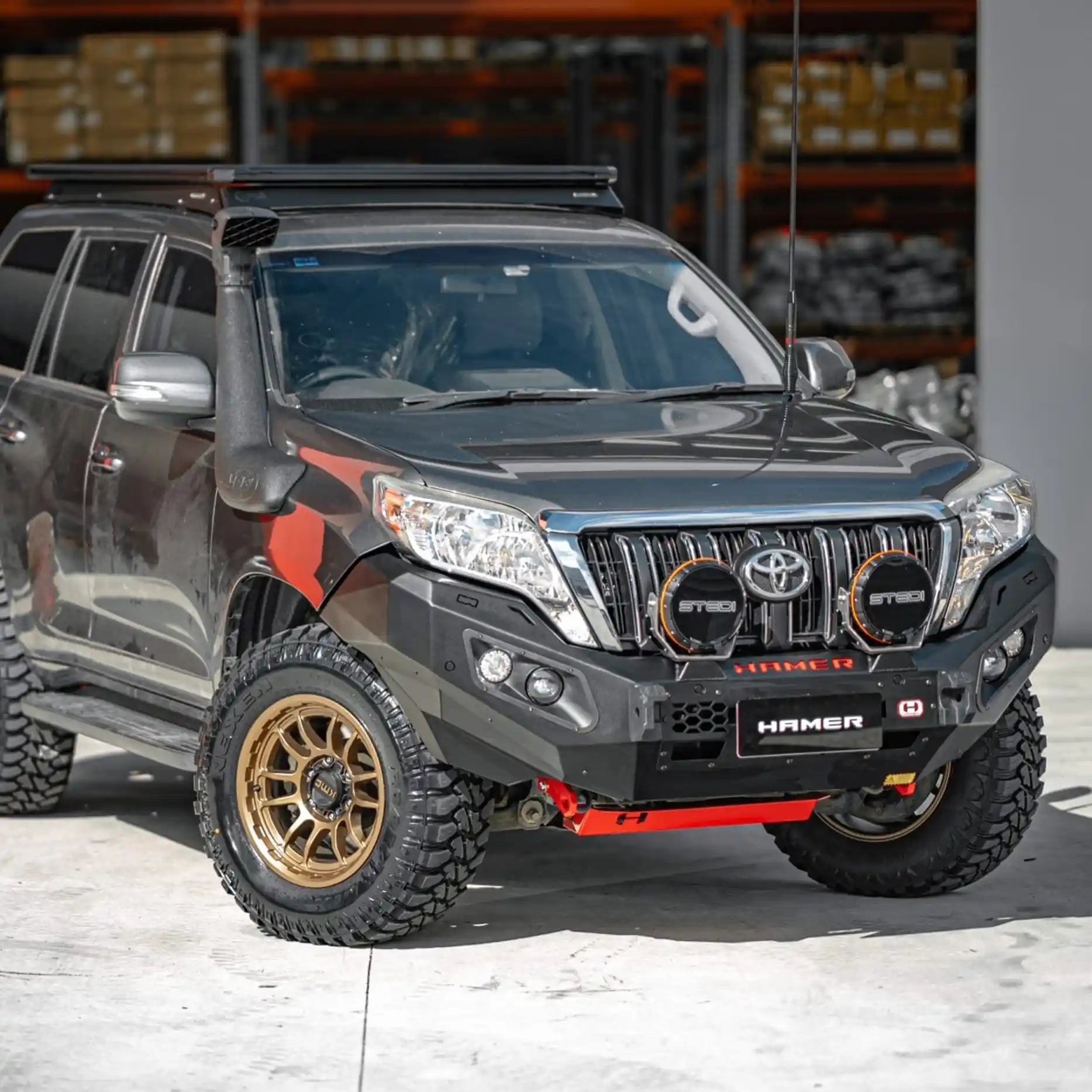 Left side view of Prado 150 (2013–2017) with Hamer King Bull Bar, recovery points and factory sensor integration.