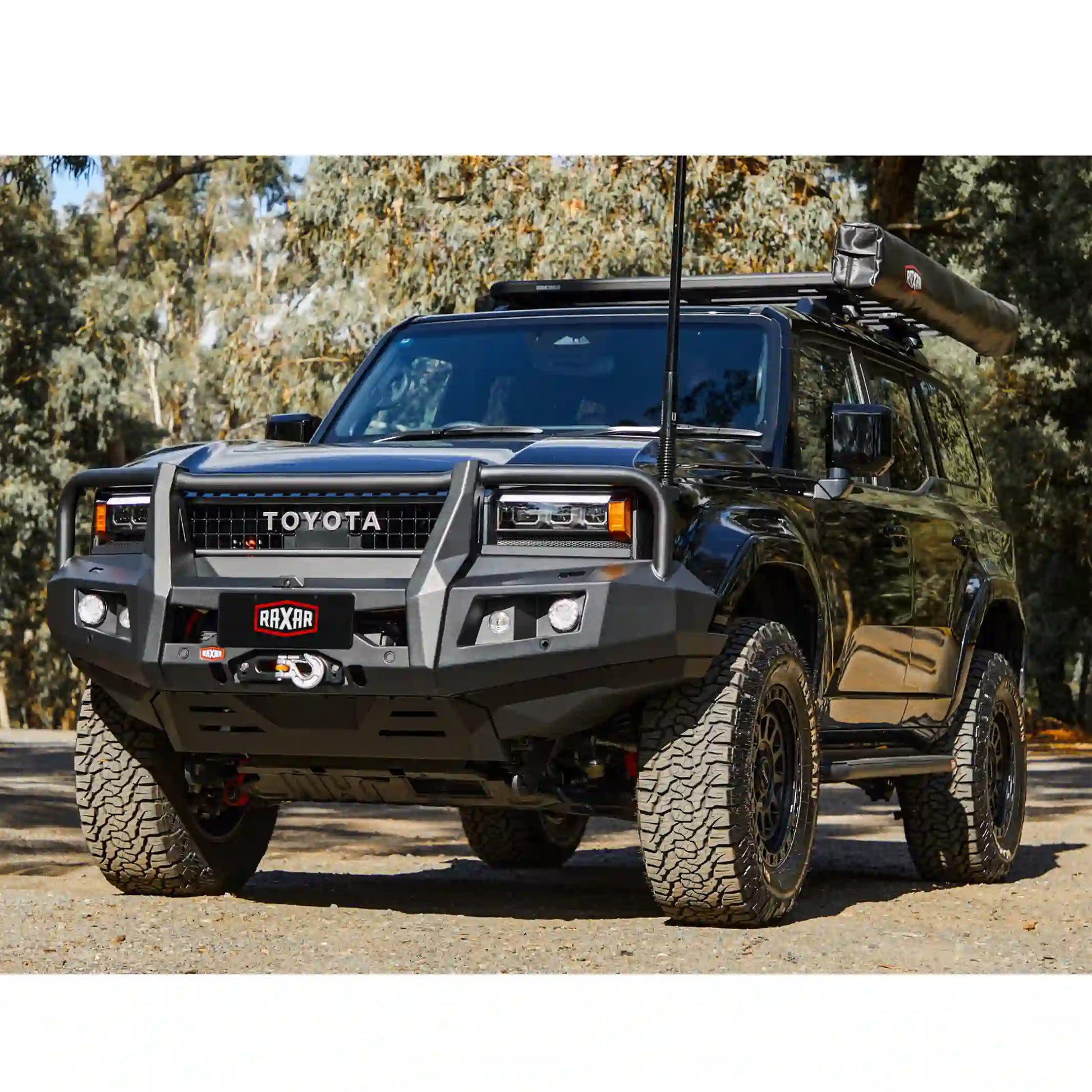 This Toyota Prado 250 installed looped bull bar side view from Elevated 4x4 demonstrates precise fitment, powder-coated durability, and compatibility with modern safety tech. Engineered by RAXAR for Australian touring and off-road conditions, it ensures a balance of rugged protection and sleek appearance.